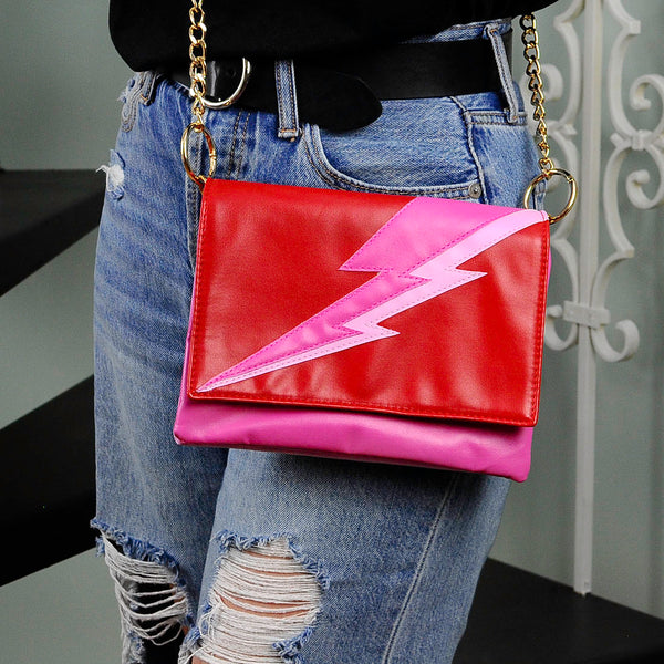 red and pink lightning bolt crossbody bag