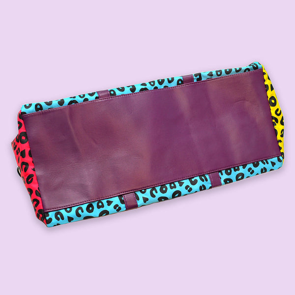 neon leopard print duffel bag bottom
