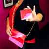 red and pink lightning bolt card wallet
