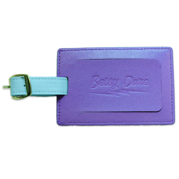 purple and teal lightning bolt luggage tag